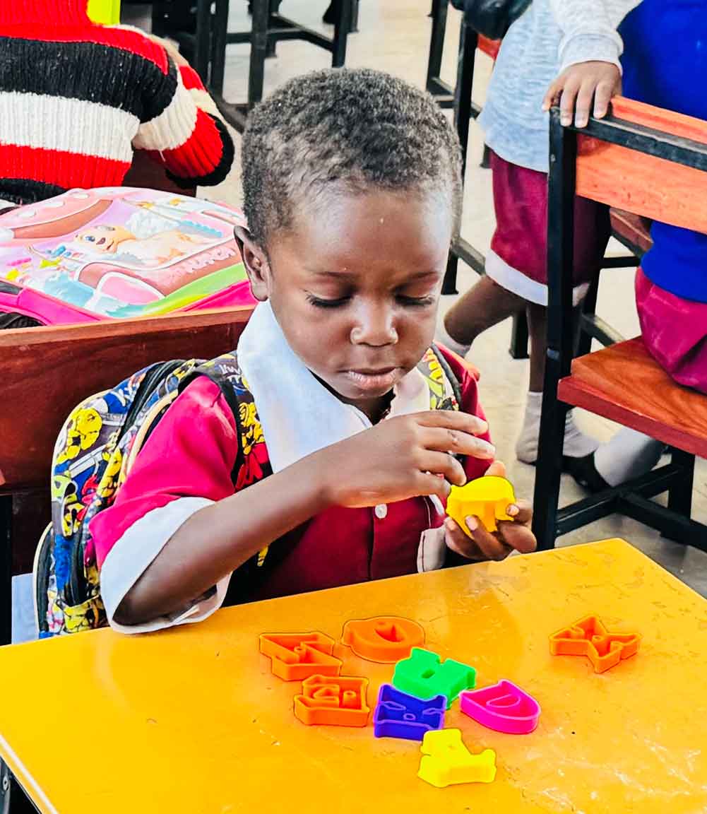 Young children in an early childhood classroom in Tabora