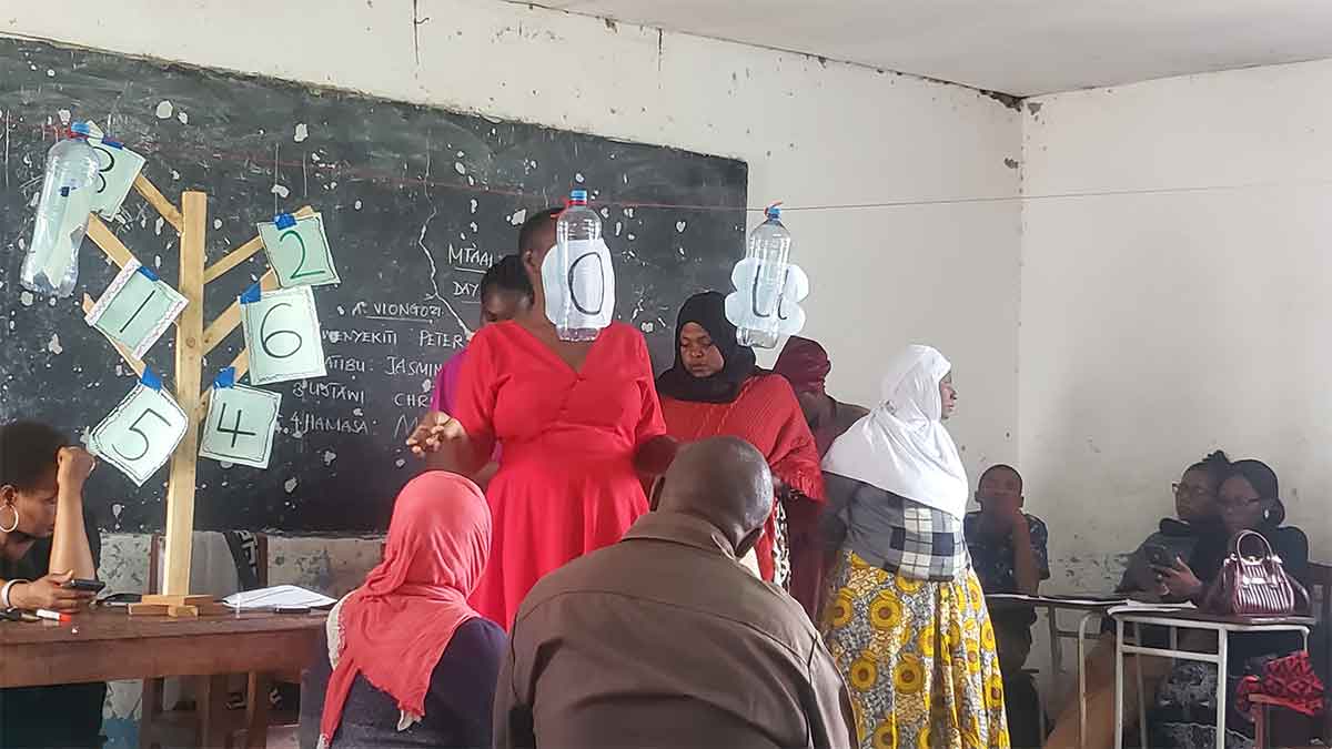 Teachers working together during training