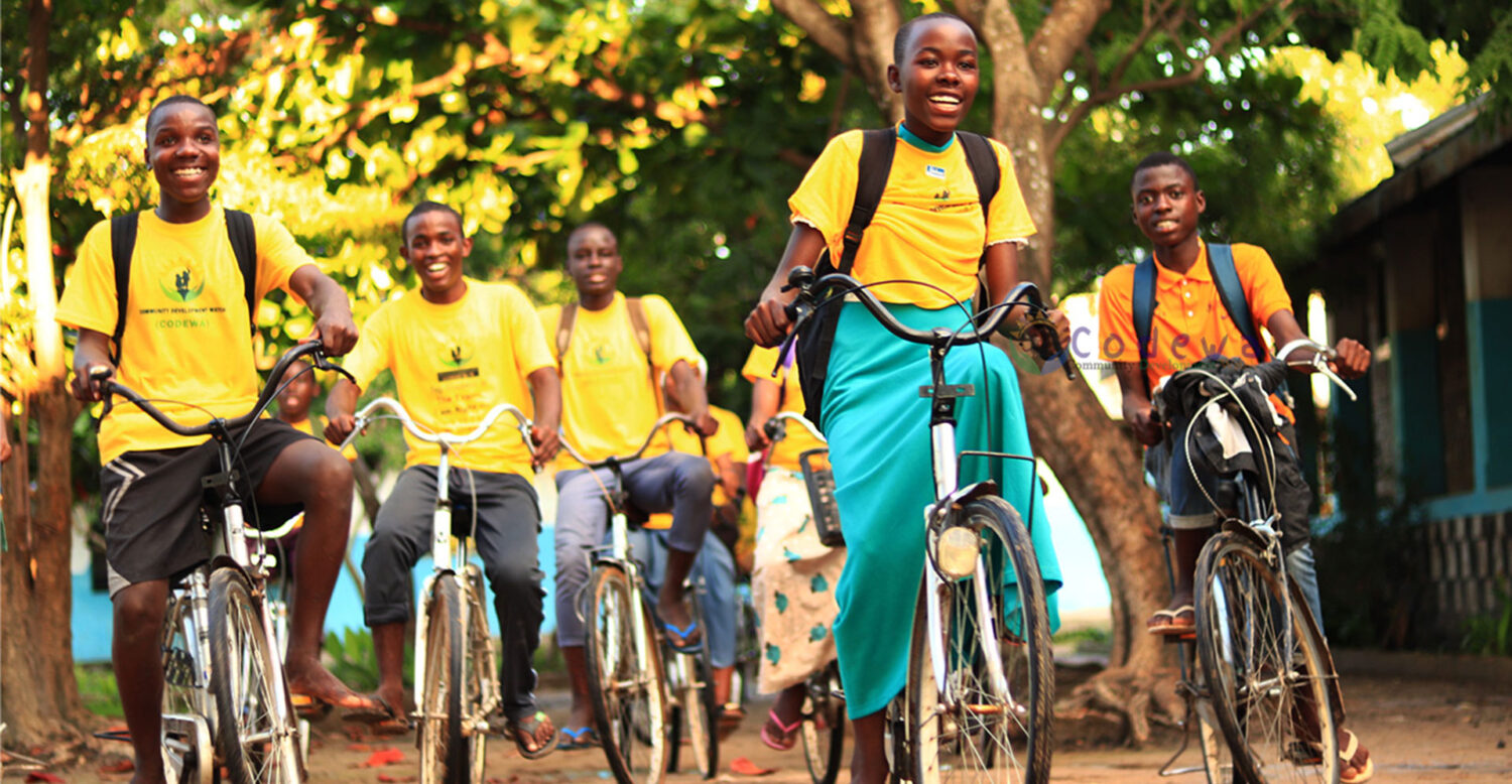 Girl with bicycle in rural Tabora