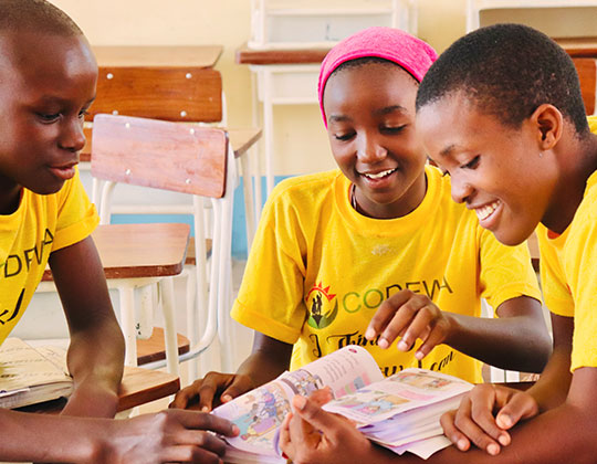 Students with school kits in Tabora