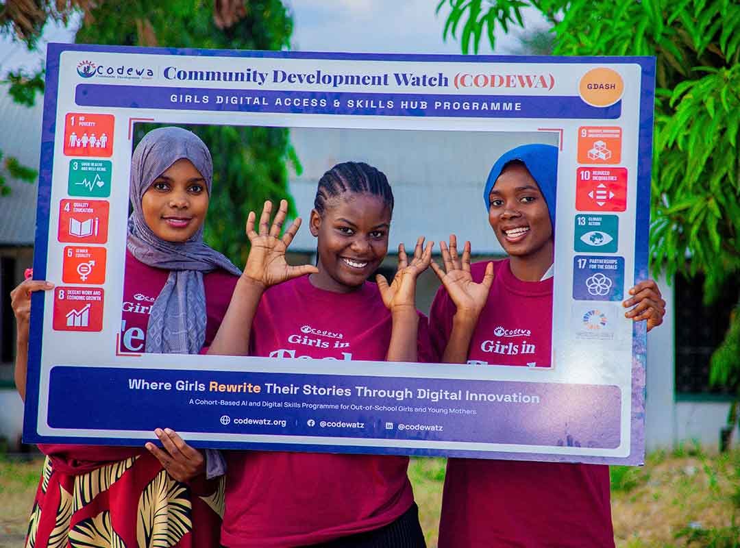 Girls focused on Canva design work
