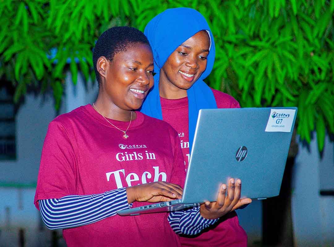 Girls working on laptops at GDASH hub